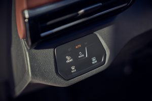 The headlight and defroster controls of a VW ID.4