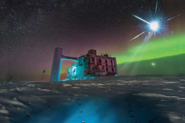 Artistic rendering of the IceCube laboratory at the South Pole.  A distant source emits neutrinos which are then detected under the ice by IceCube sensors.