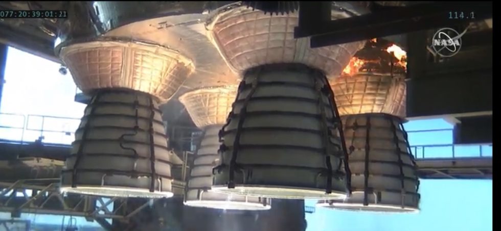 Cork insulation around one of the rocket's four main engines catches fire.