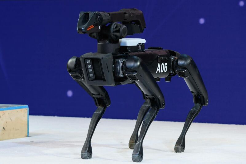 A black robot that is in the abstract shape of a dog.