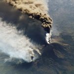 Aerial photograph of volcanic eruption.