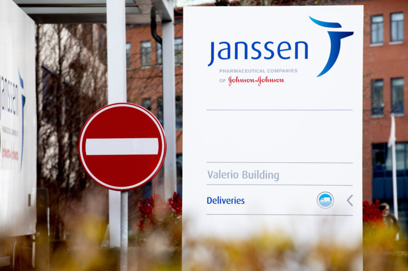 A large streetside sign for a Johnson and Johnson vaccine.