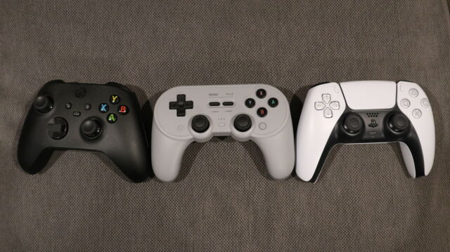 The 8BitDo Pro 2 (middle) is an excellent "pro" controller upgrade for gamers on Switch and PC.