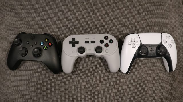 The 8BitDo Pro 2 (middle) is a comfortable, feature-rich gamepad for Switch, PC, and mobile devices.