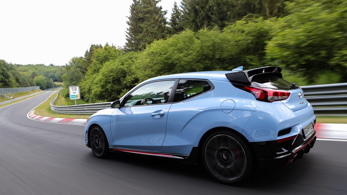 A blue Hyundai Veloster N at the Nurburging