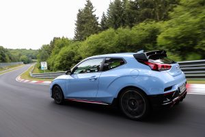 A blue Hyundai Veloster N at the Nurburging
