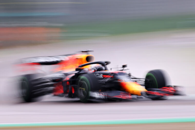 A blurry photo of a Red Bull Racing F1 car at speed