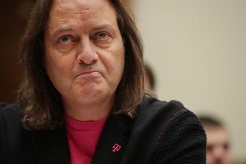 Then-T-Mobile CEO John Legere testifying at a Congressional committee hearing.