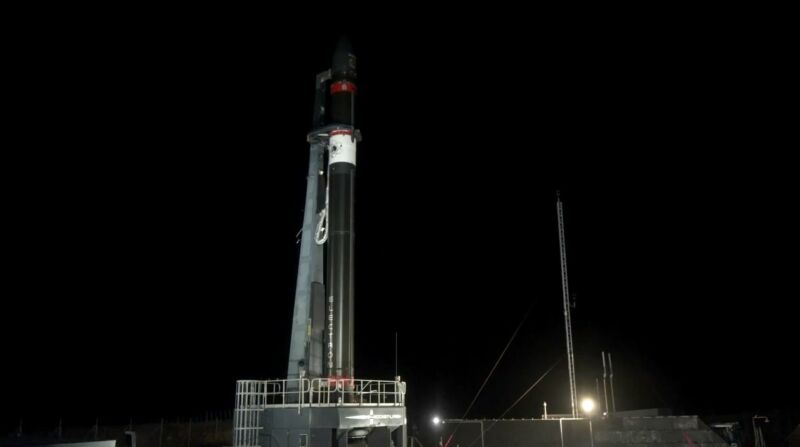 Rocket Lab's Electron vehicle stands on the pad in New Zealand prior to Saturday's launch. 