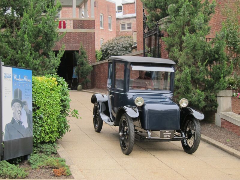 A 1921 Milburn Electric car leaves the garage at the Woodrow Wilson House on Oct. 11, 2011