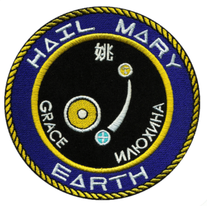 The <em>Project Hail Mary</em> mission patch, depicting Sol, Earth, Tau Ceti, and the names of the ship's crew.