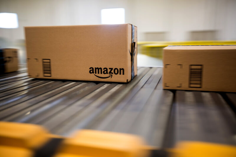 Boxes move along a conveyor belt at the Amazon.com Inc. fulfillment center in Robbinsville, New Jersey.