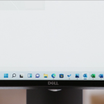 Once a snap layout is populated with apps, the whole thing can be tied together as a snap group. The connection between apps in snap groups is visible in this close-up of the new taskbar.