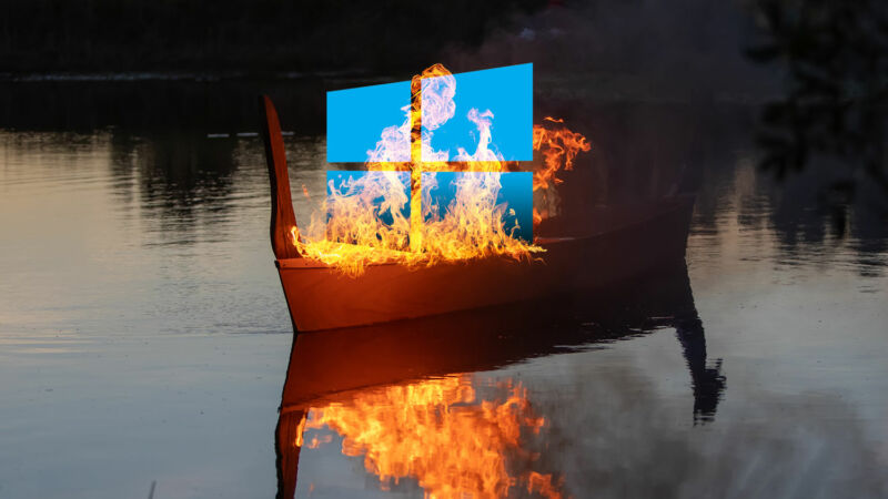 A burning canoe has been photoshopped to include a Windows logo.