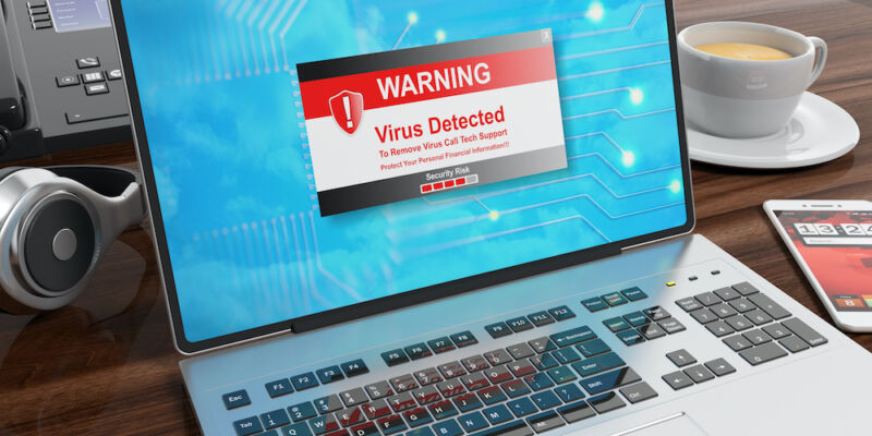 Stock photo of a virus warning on a laptop screen.