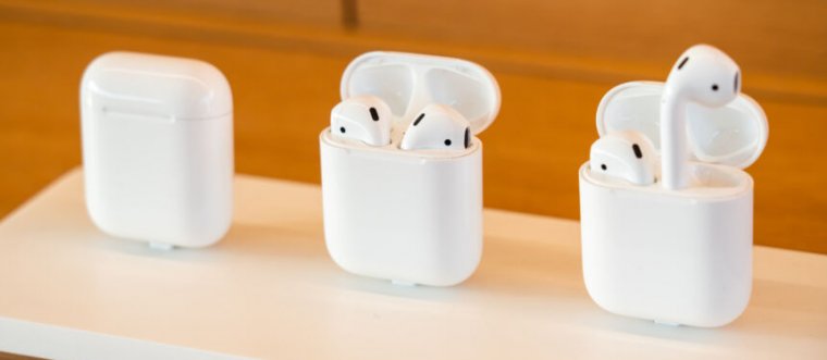 These AirPods, on display at the Apple Park Visitor Center in Cupertino, are genuine, but it's not always easy to tell the difference between real and fake electronic devices.