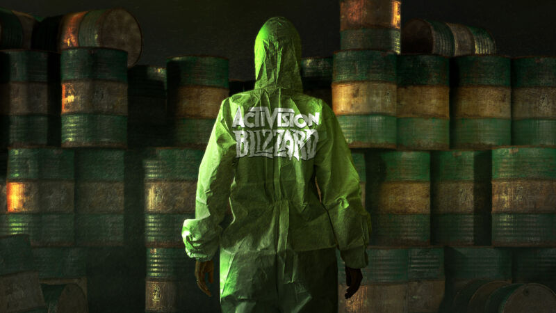 Photoshopped image from a video game shows a person in an Activision Blizzsard hoodie confronted barrels filled, presumably, with gasoline.