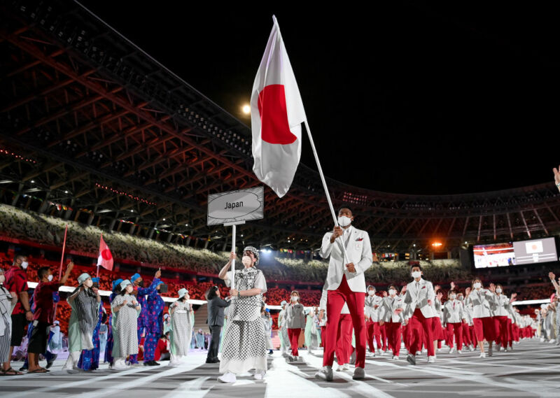 Flag bearers Yui Susaki and Rui Hachimura of Team Japan lead their team out during the Opening Ceremony of the Tokyo 2020 Olympic Games at Olympic Stadium on July 23, 2021 in Tokyo, Japan. 