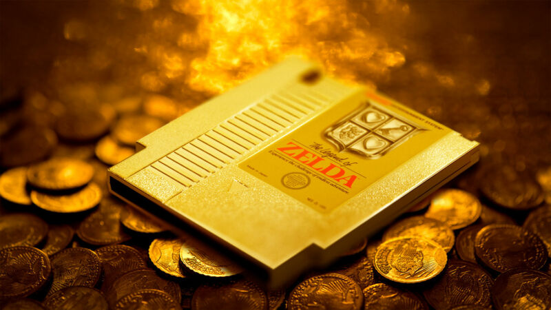 A golden, 8-bit Zelda cartridge sits atop a mess of gold coins.