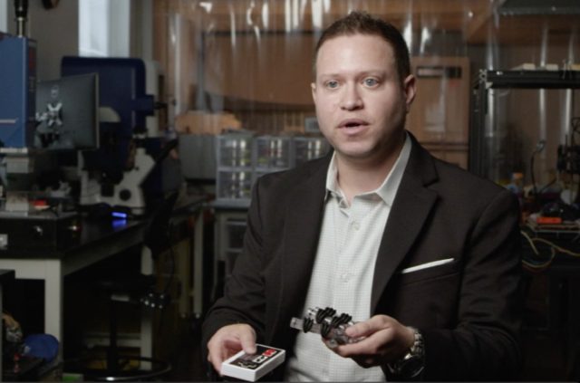 University of Maryland mechanical engineer Ryan D. Sochol shows off his team's gentle robotic hand.