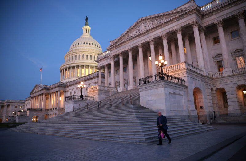 Sen. Mark Kelly (D-Ariz.) departs the US Capitol at dawn after an overnight session of the US Senate on August 11, 2021, in Washington, DC. Sen. Kelly was one of three Democratic Senators who voted to gut the plug-in vehicle tax credit.