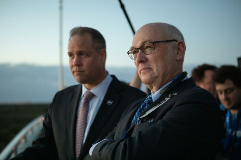 NASA Administrator Jim Bridenstine, left, and Tory Bruno, president and chief executive officer of United Launch Alliance, wait at NASA’s Kennedy Space Center in Florida to see the liftoff of a United Launch Alliance Atlas V rocket carrying Boeing’s CST-100 Starliner spacecraft on Dec. 20, 2019.