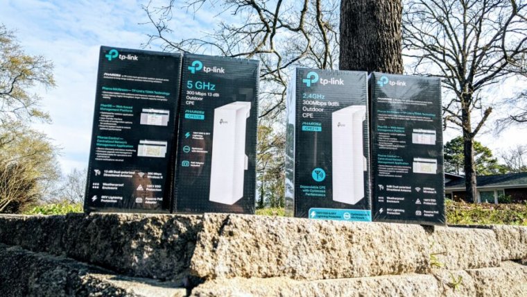 We tested these TP-Link outdoor Wi-Fi bridges—both 2.4GHz and 5GHz versions—across 80 meters of partially wooded terrain, with great success.