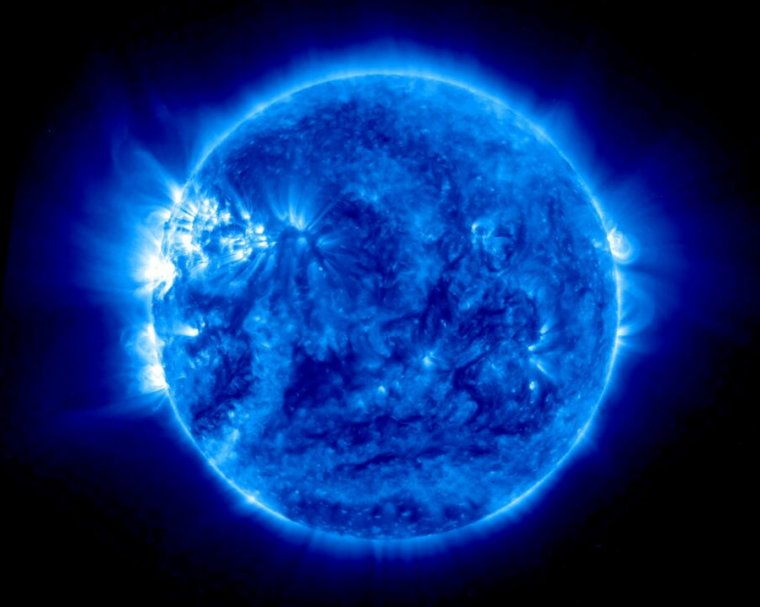 A stylized photograph of the Sun renders it blue.