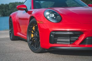 the front of a red Porsche 911 GTS
