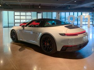 A white Porsche 911 Targa 4 GTS at the Porsche Experience Center in Atlanta