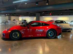 A red Porsche 911 GTS at the Porsche Experience Center in Atlanta