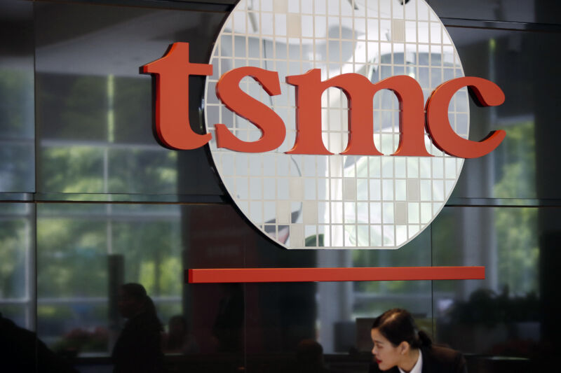 Signage for Taiwan Semiconductor Manufacturing Co. (TSMC) is displayed inside the company's headquarters in Hsinchu, Taiwan.