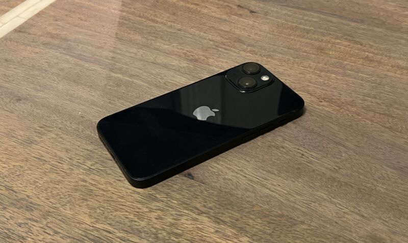 A black smartphone with two cameras.