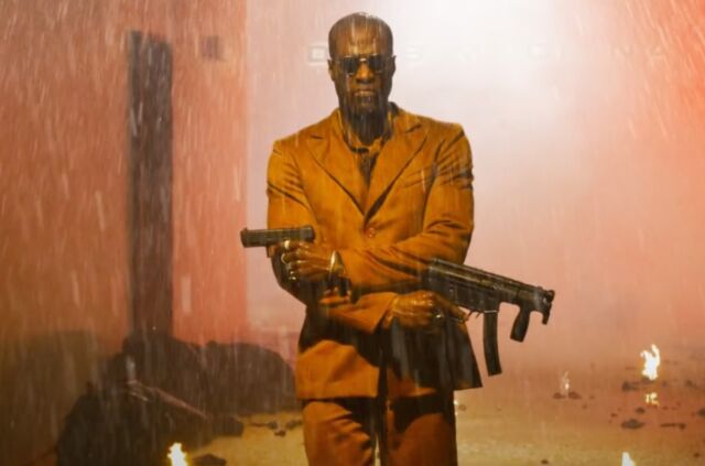 Two guns are better than one for this new version of Morpheus (Yahya Abdul-Mateen II).