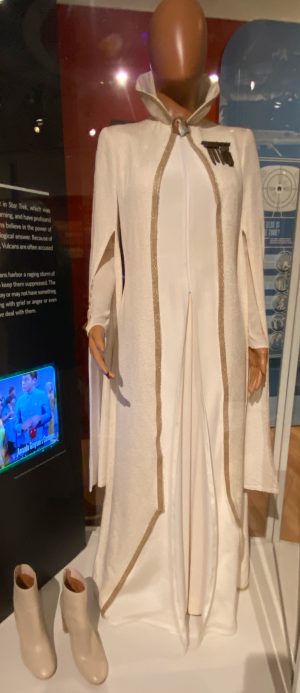 Costume from Star Trek franchise is displayed in a museum.