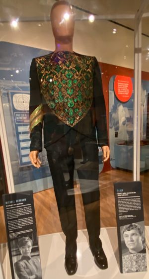 Costume from Star Trek franchise is displayed in a museum.