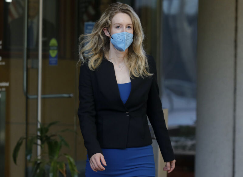 Theranos founder Elizabeth Holmes leaves the Robert F. Peckham Federal Building and the US Courthouse in San Jose, Calif. On Wednesday, September 22, 2021. Holmes is charged with two counts of conspiracy to commit fraud by wire and nine counts of wire fraud and faces up to 20 years in prison if convicted.