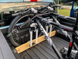 A Ford Maverick with a DIY bike rack in the bed