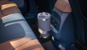 A Ford Maverick with a cupholder slotted into the FITS