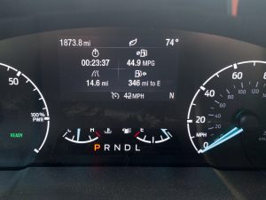 A Ford Maverick hybrid dashboard showing 45 mpg over 15 miles