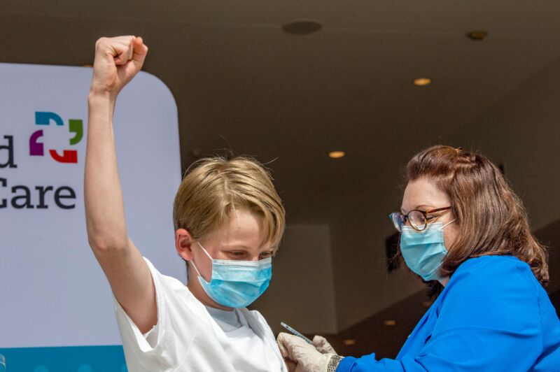 A 13-year-old celebrates getting the Pfizer-BioNTech COVID-19 vaccine in Hartford, Connecticut, on May 13, 2021.