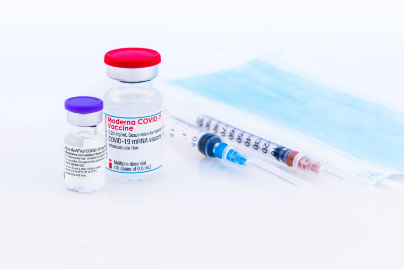 Image of vaccine vials and syringes.