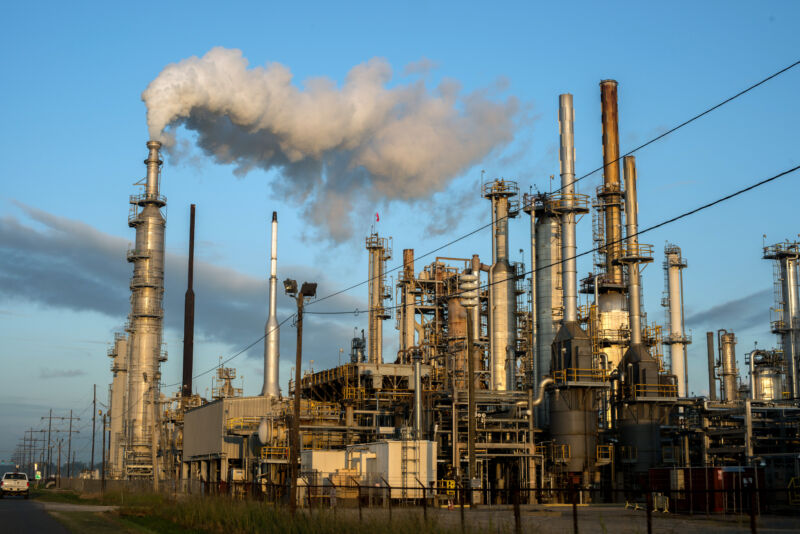 Smoke billows from one of many chemical plants near Baton Rouge, Louisiana. "Cancer Alley" is one of the most polluted areas of the US and lies along a stretch of the once-pristine Mississippi River that runs some 80 miles from New Orleans to Baton Rouge. The alley is home to a dense concentration of oil refineries, petrochemical plants, and other chemical industries alongside suburban homes.