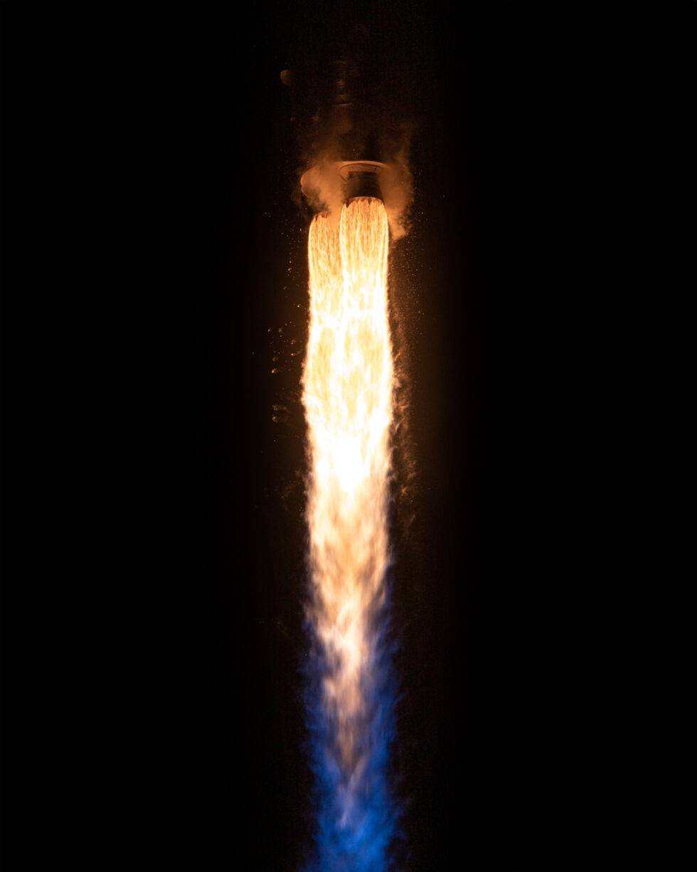 Underexposed engine shot of the dual-nozzle RD-180 powering Atlas V.