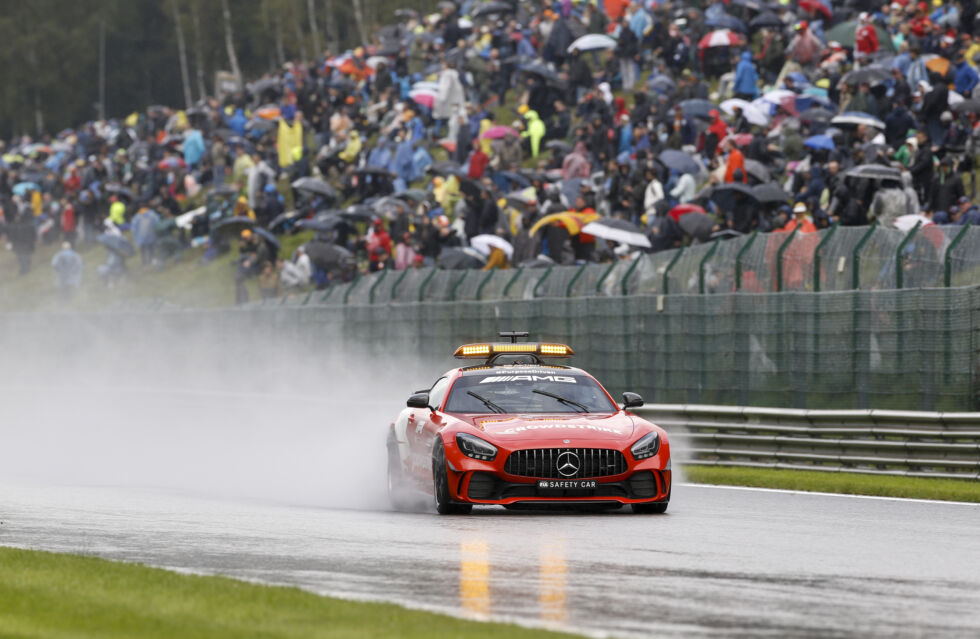 Mayländer drives the safety car during wet conditions during the Saturday of the 2021 Belgian Grand Prix. When the track is this wet, the spray lifted into the air by the F1 cars' wet tires can make it impossible to race safely.