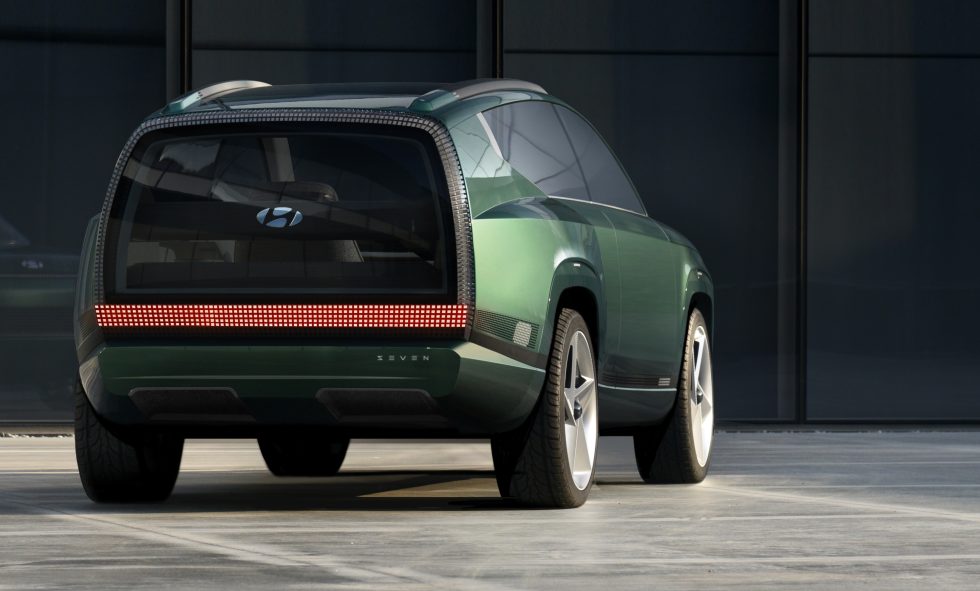 The pixellated tail lights emphasize the width of the Seven.