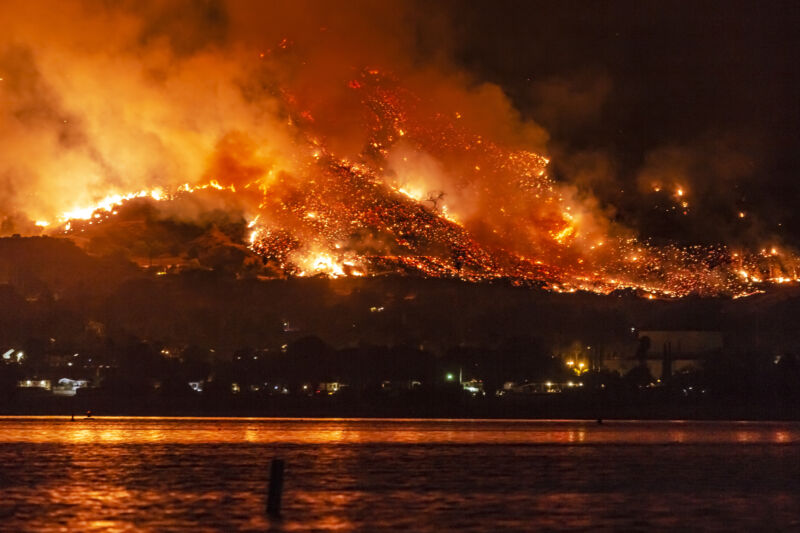 Image of a wildfire at night.