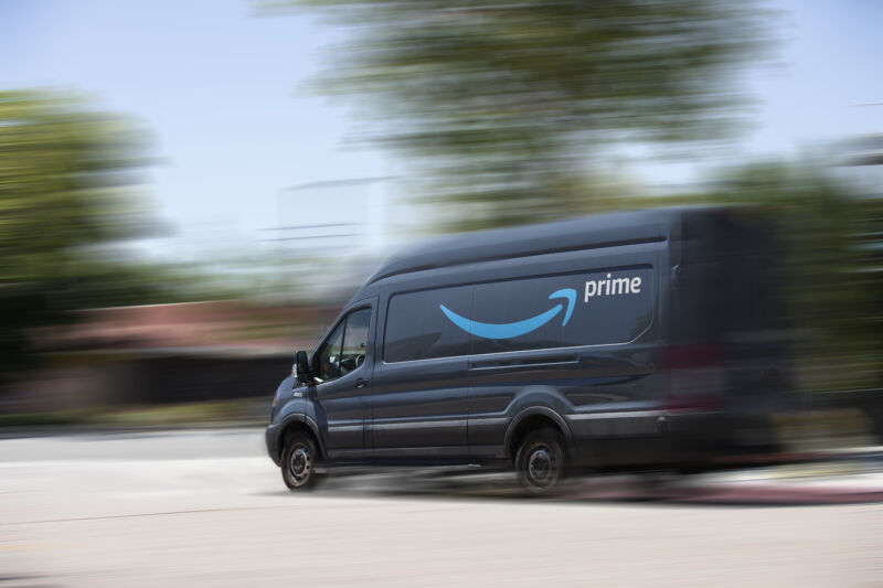 An Amazon delivery truck drives down a street in Anaheim, California.