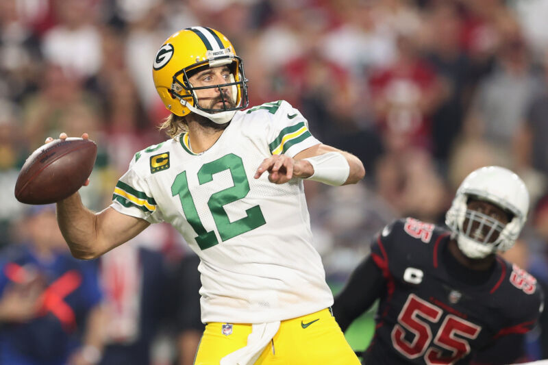 Quarterback Aaron Rodgers of the Green Bay Packers throws a pass during an NFL game at State Farm Stadium on October 28, 2021, in Glendale, Arizona.