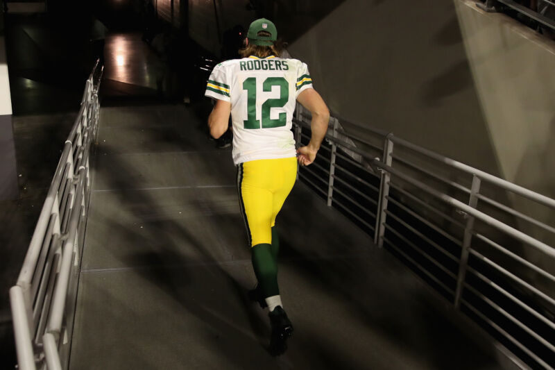 Quarterback Aaron Rodgers of the Green Bay Packers trots off the field following the NFL game at State Farm Stadium on October 28, 2021, in Glendale, Arizona. 